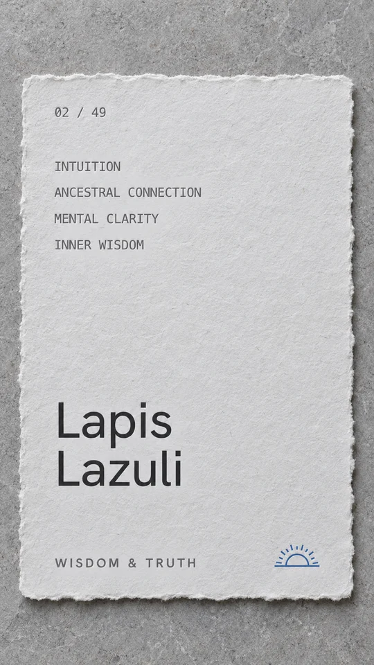 The Lapis Lazuli stone card photographed straight on, handmade paper with torn edges and a blue sunrise mark